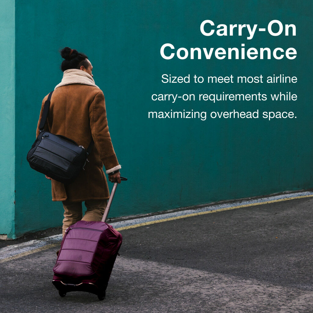 Person walking with a purple suitcase and black shoulder bag against a teal wall with text overlay.