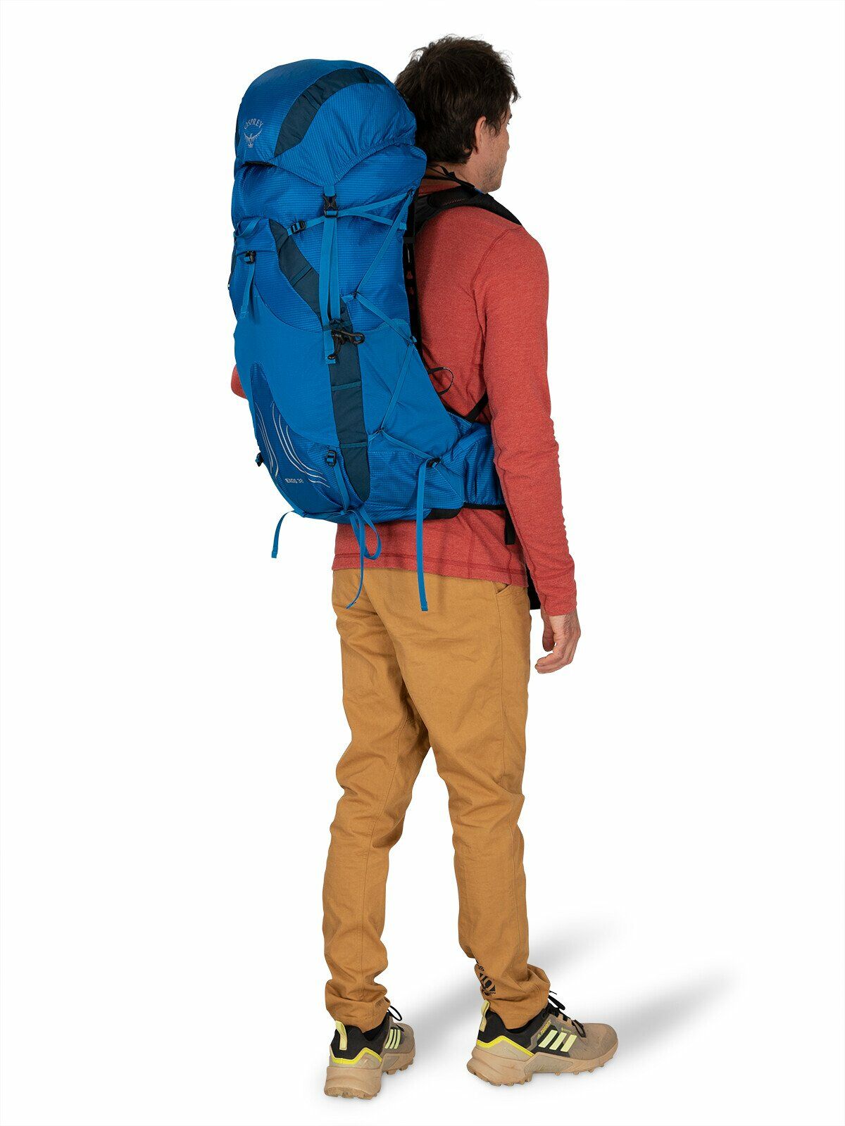 a person modeling the EXOS 38 in color Blue Ribbon