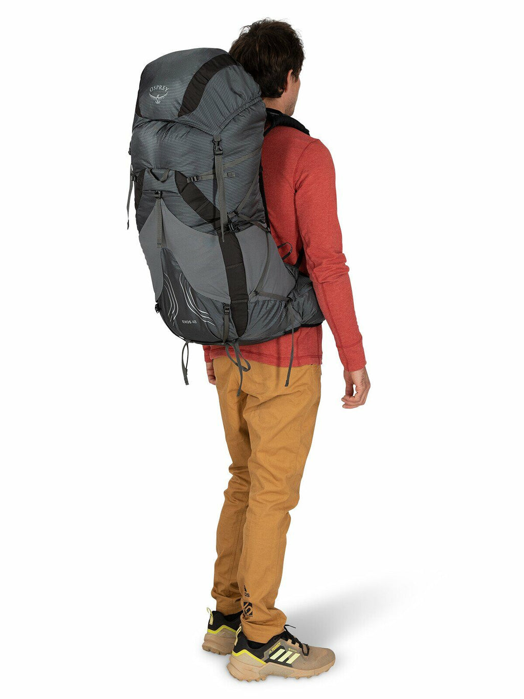 a person modeling the EXOS 48 in color Tungsten Grey
