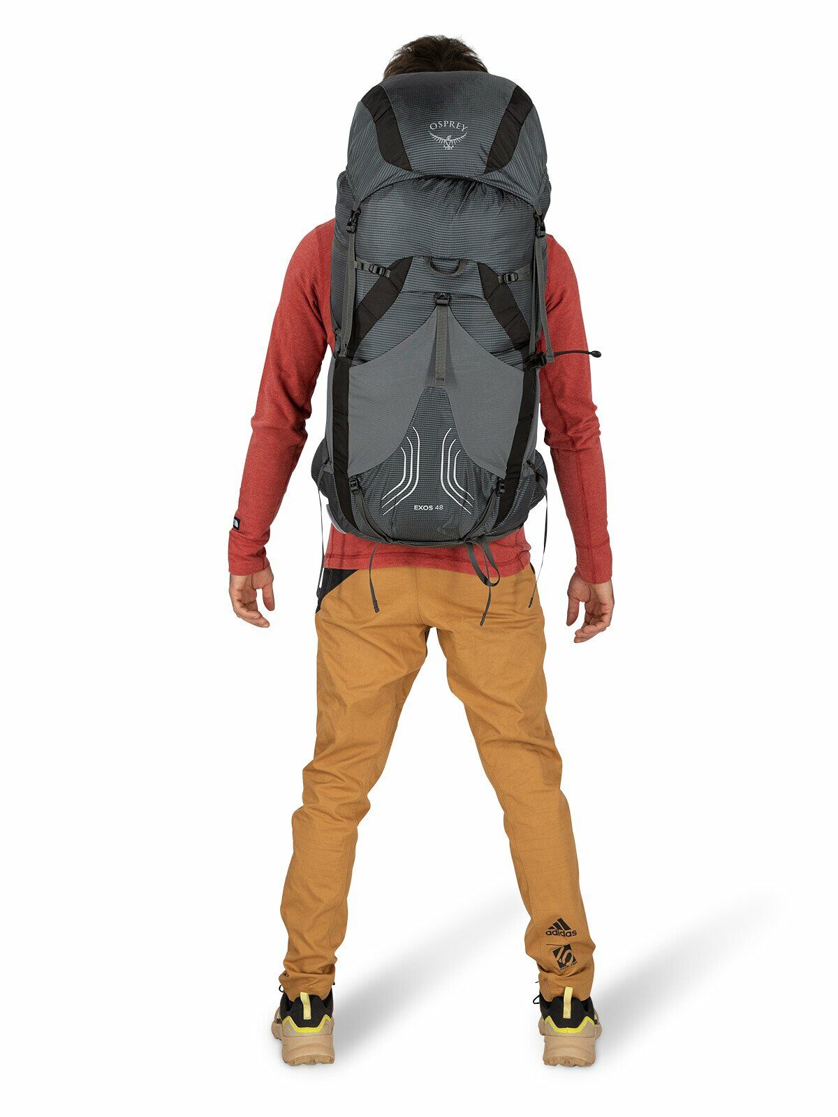 a person modeling the EXOS 48 in color Blue Ribbon