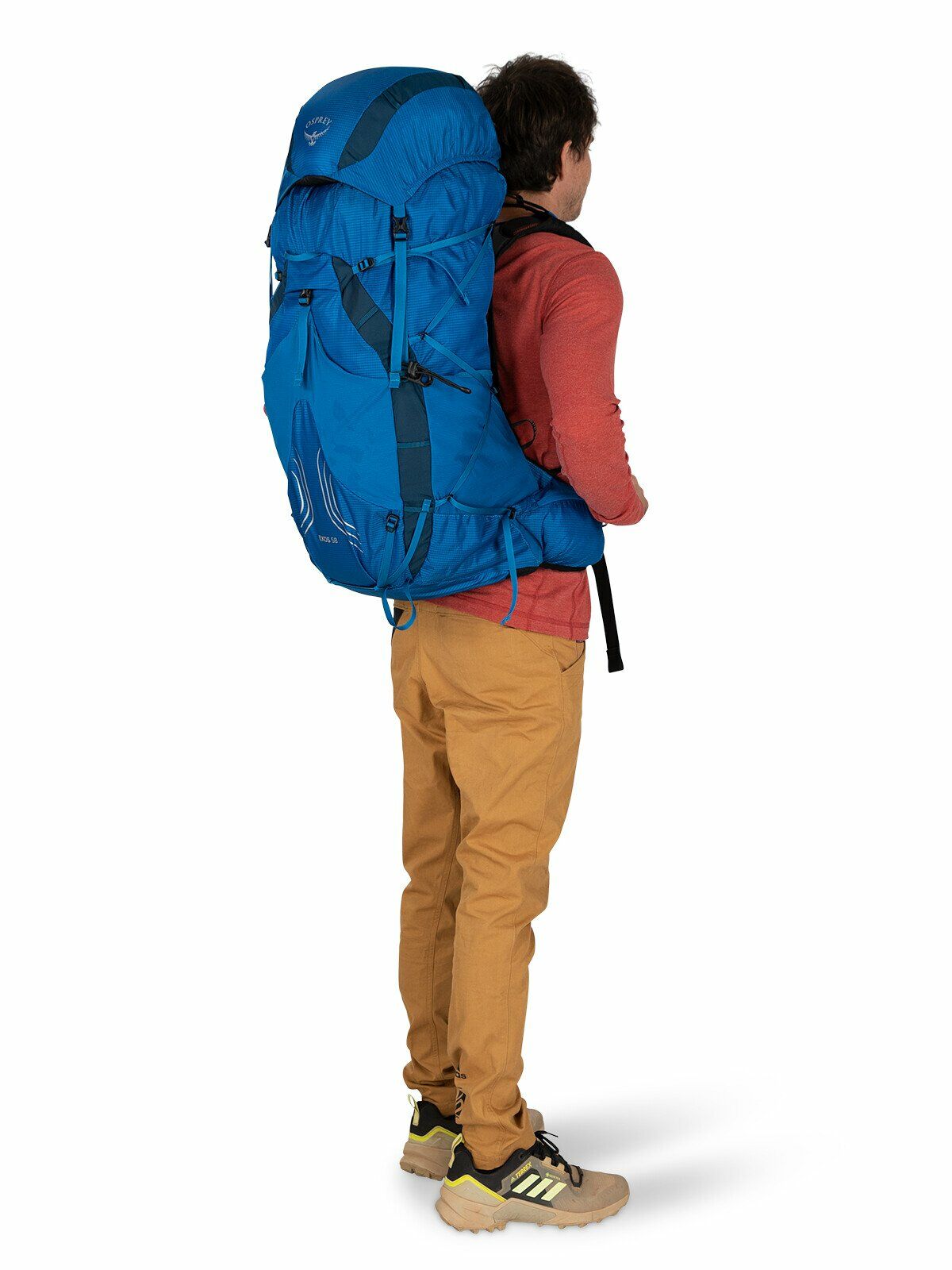 a person modeling the EXOS 58 in color blue