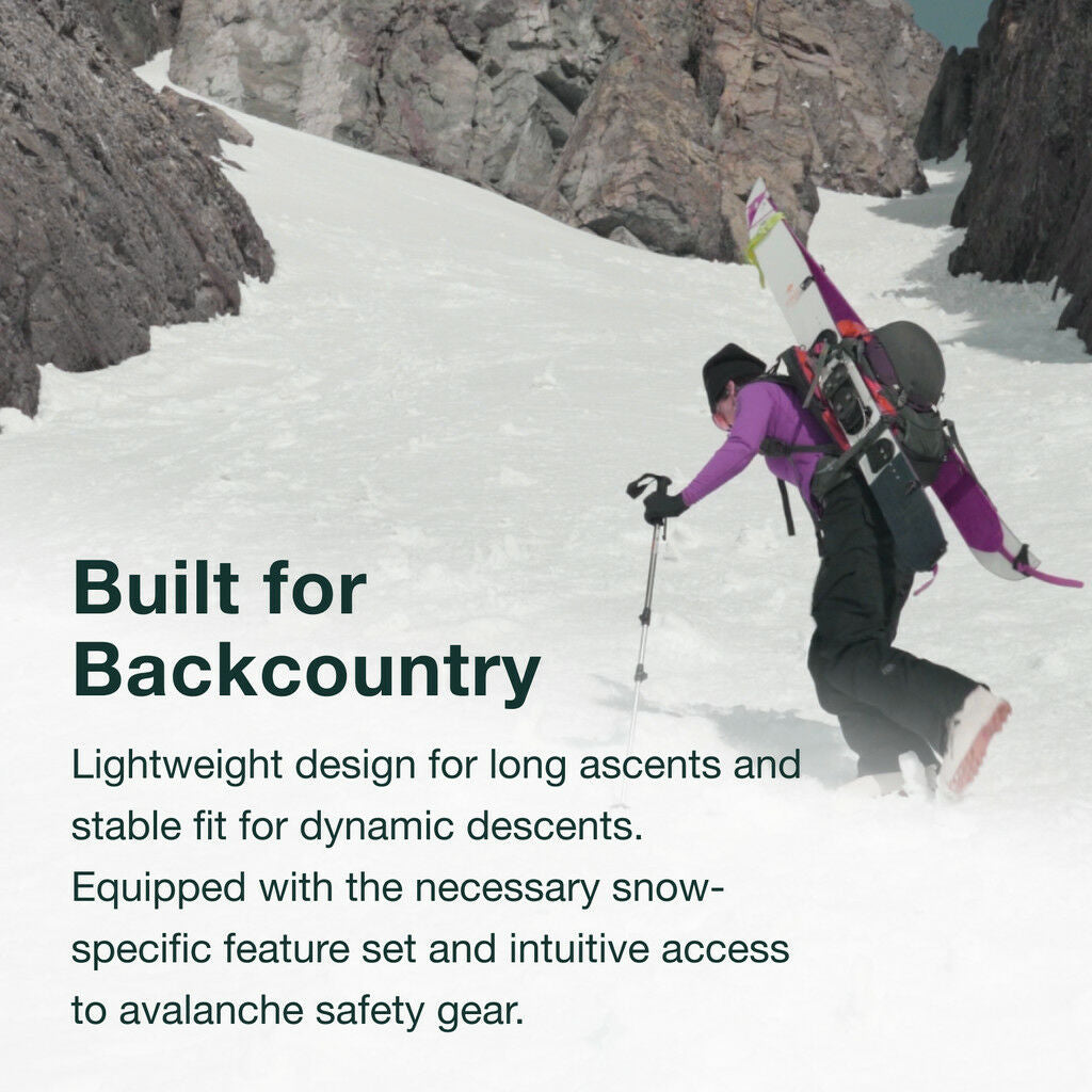 Skier with backpack on a snowy mountain slope.