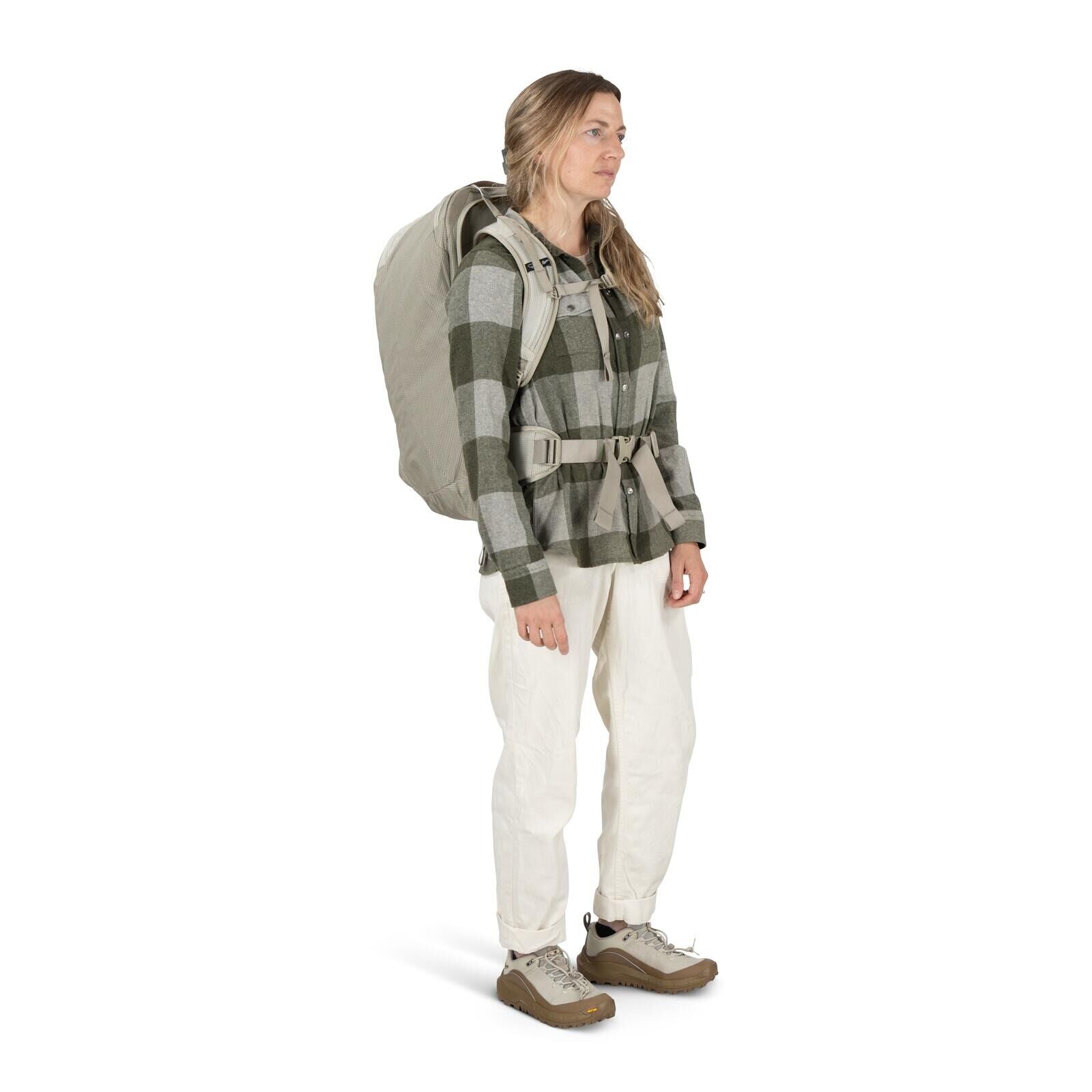 Model on-body image of Osprey Fairview 40 and Danner collaboration in the color Sandy Grey-Sawdust
