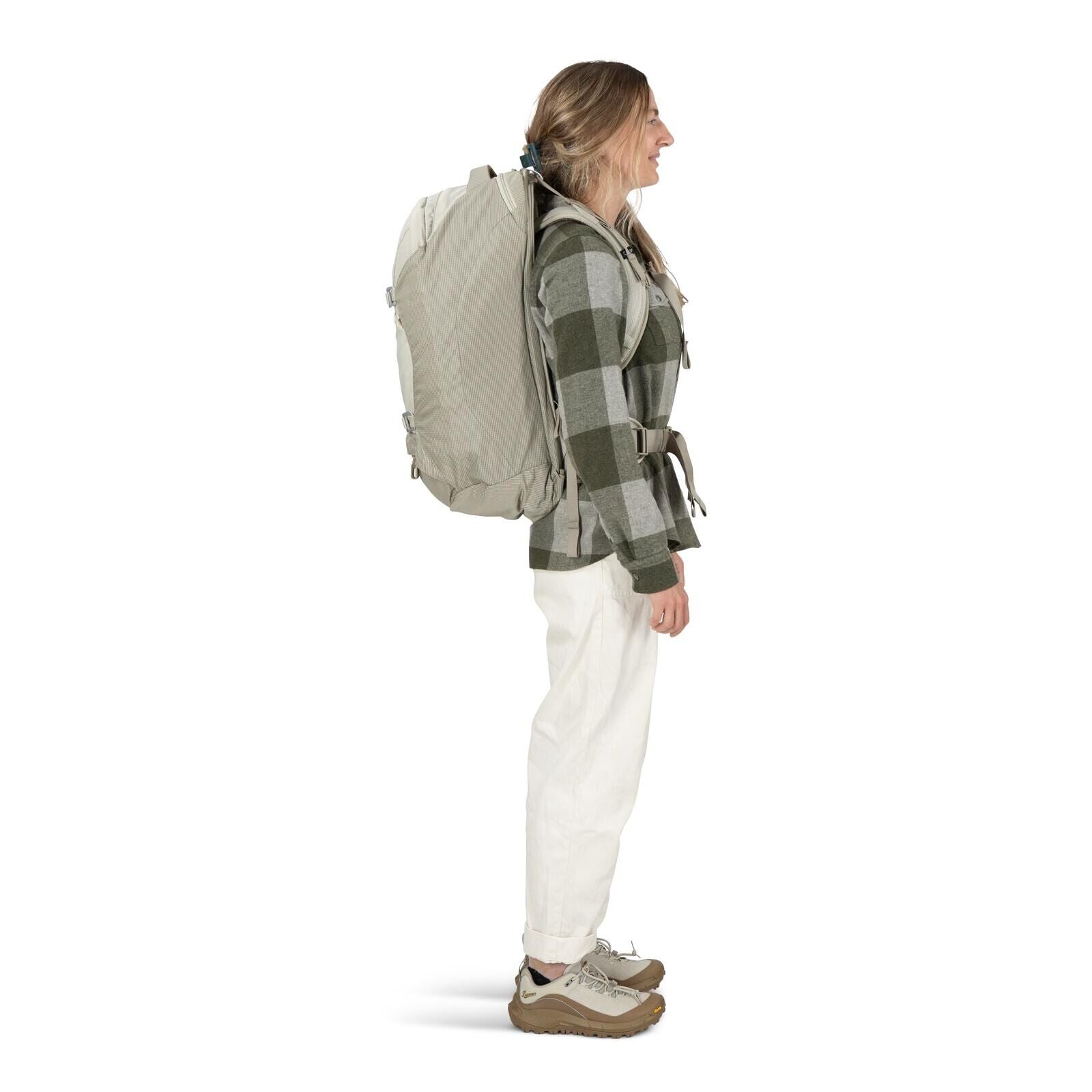 Model on-body image of Osprey Fairview 40 and Danner collaboration in the color Sandy Grey-Sawdust