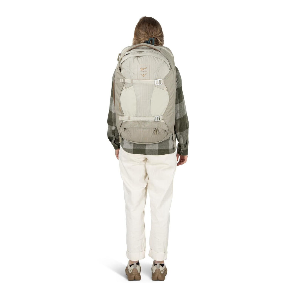 Model on-body image of Osprey Fairview 40 and Danner collaboration in the color Sandy Grey-Sawdust