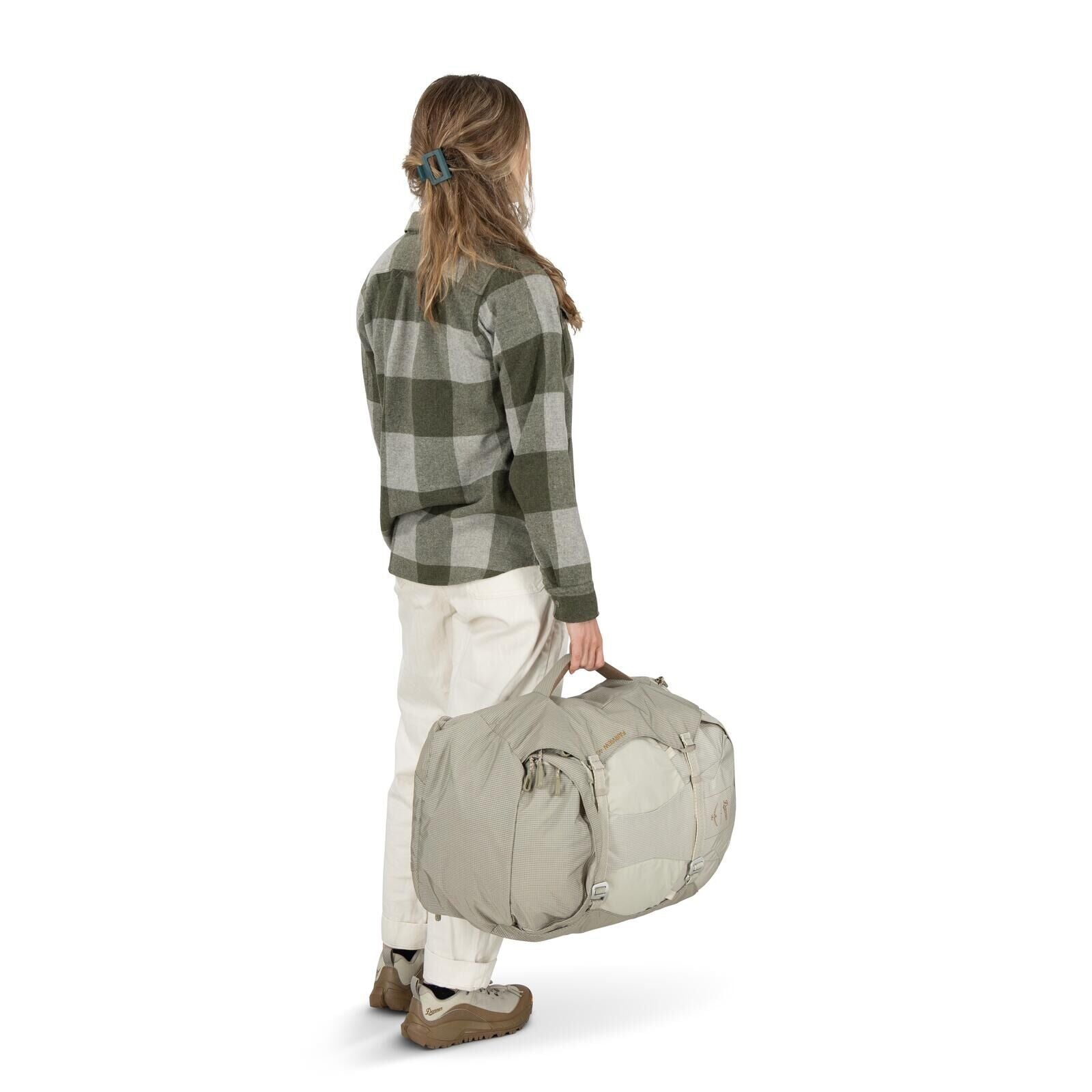 Model on-body image of Osprey Fairview 40 and Danner collaboration in the color Sandy Grey-Sawdust