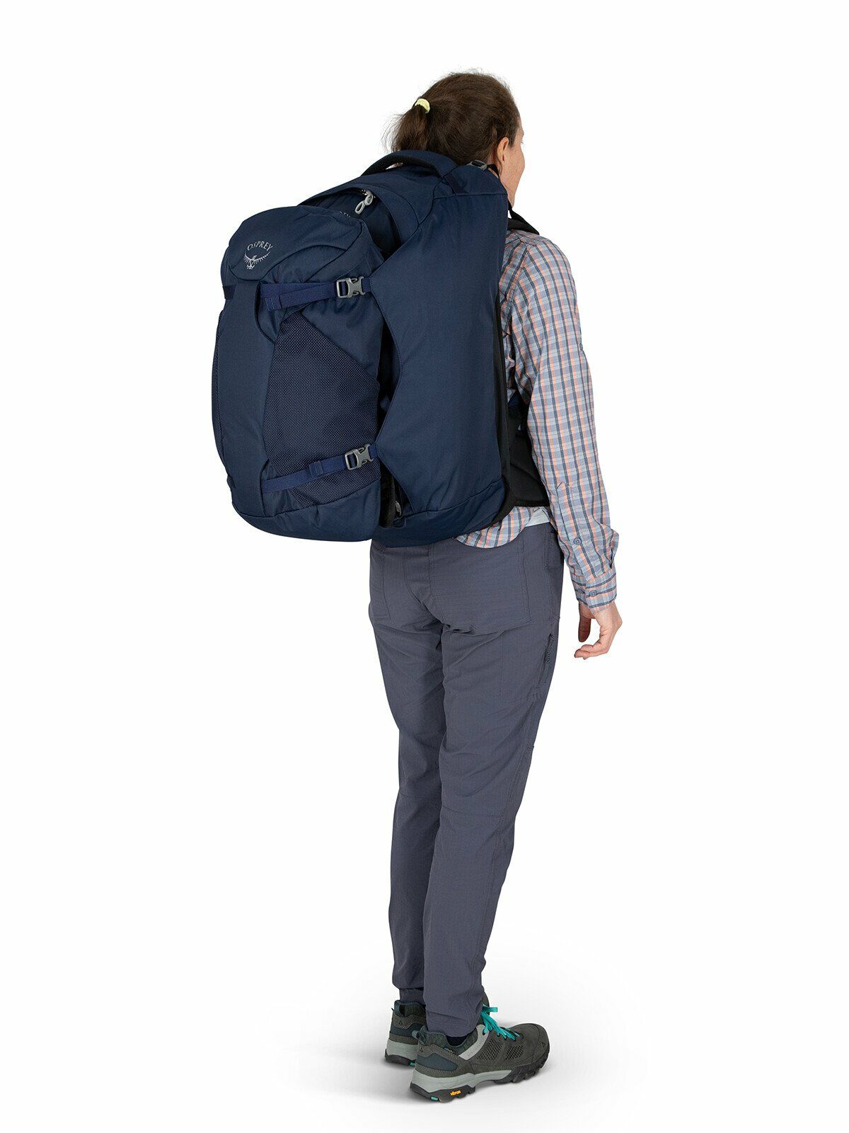 a person modeling the Fairview® 55 Travel Pack in color Black