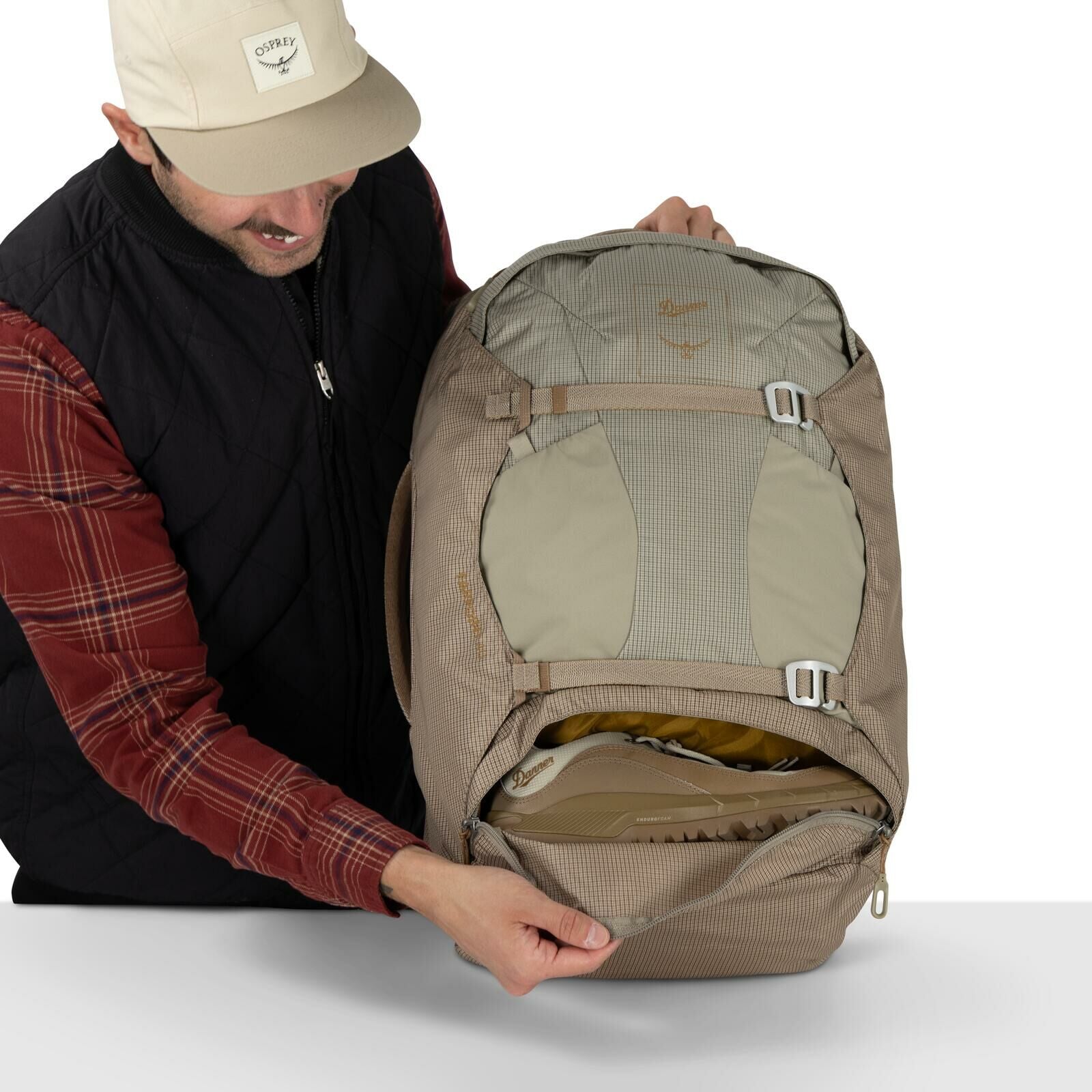Detail image of Osprey Farpoint 40 and Danner collaboration in the color Sandy Grey-Sawdust