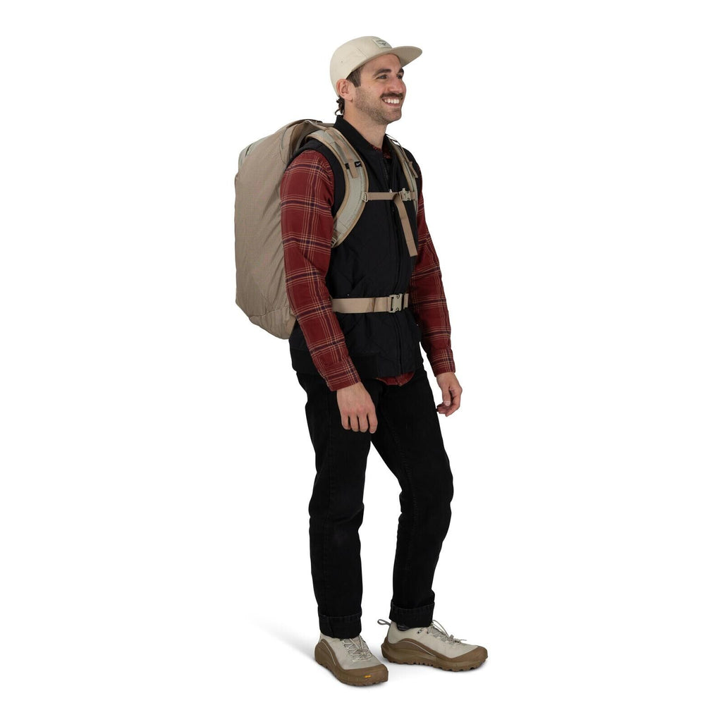 model on-body image of Osprey Farpoint 40 and Danner collaboration in the color Sandy Grey-Sawdust