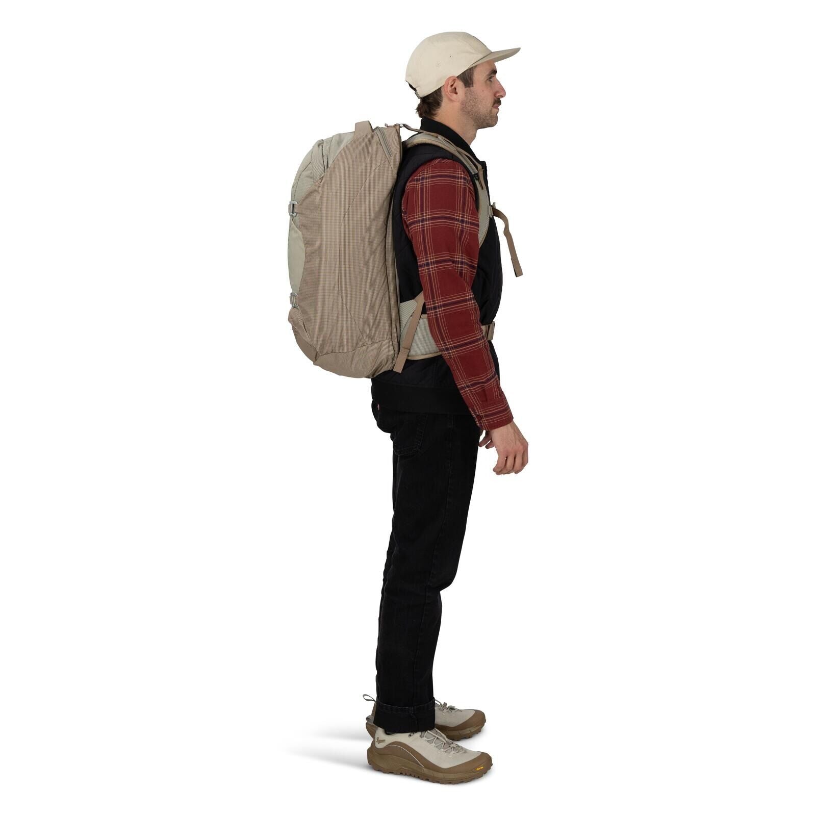 on-body image of Osprey Farpoint 40 and Danner collaboration in the color Sandy Grey-Sawdust