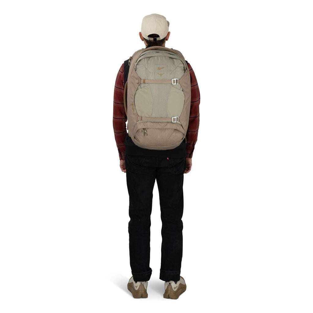 on-body image of Osprey Farpoint 40 and Danner collaboration in the color Sandy Grey-Sawdust