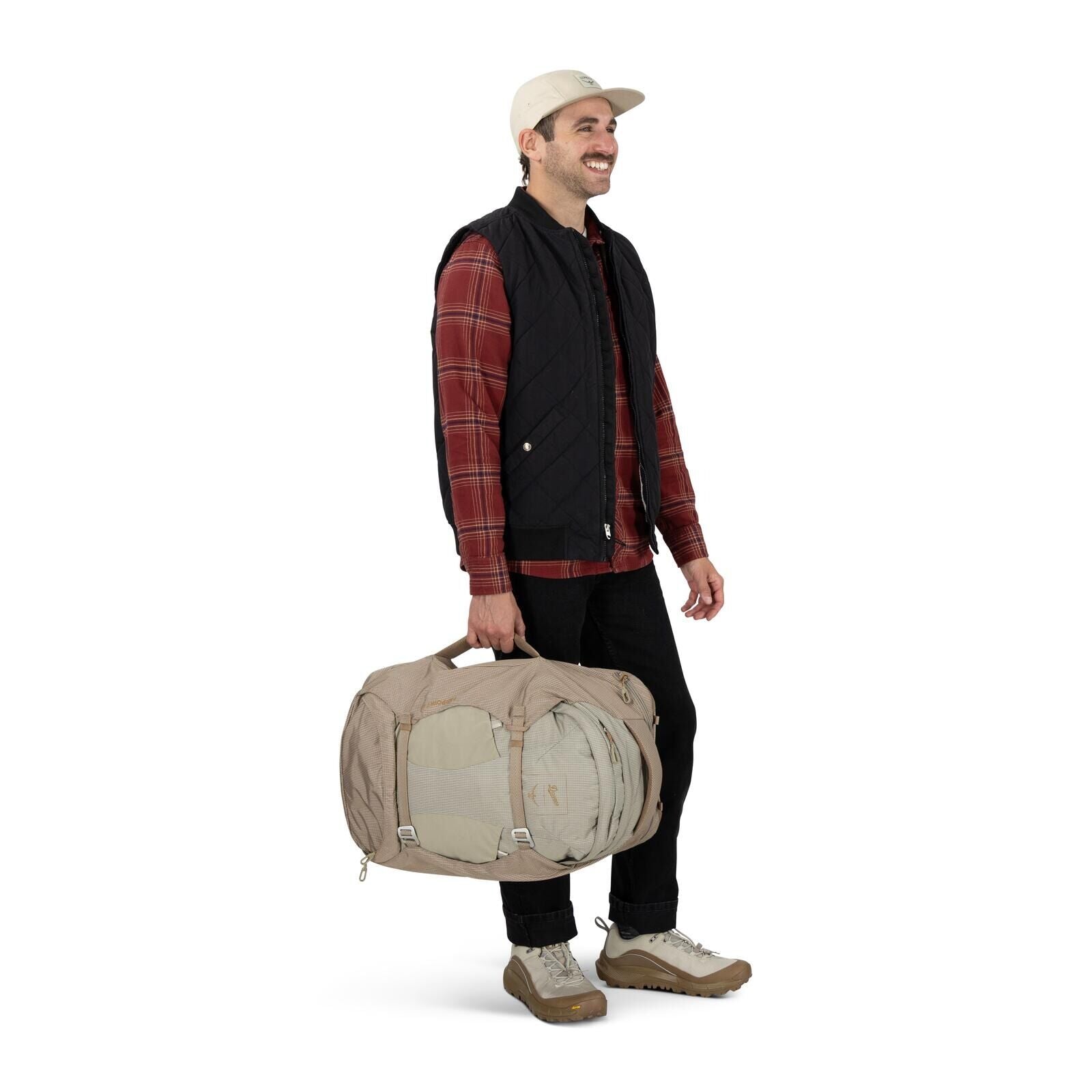 on-body image of Osprey Farpoint 40 and Danner collaboration in the color Sandy Grey-Sawdust