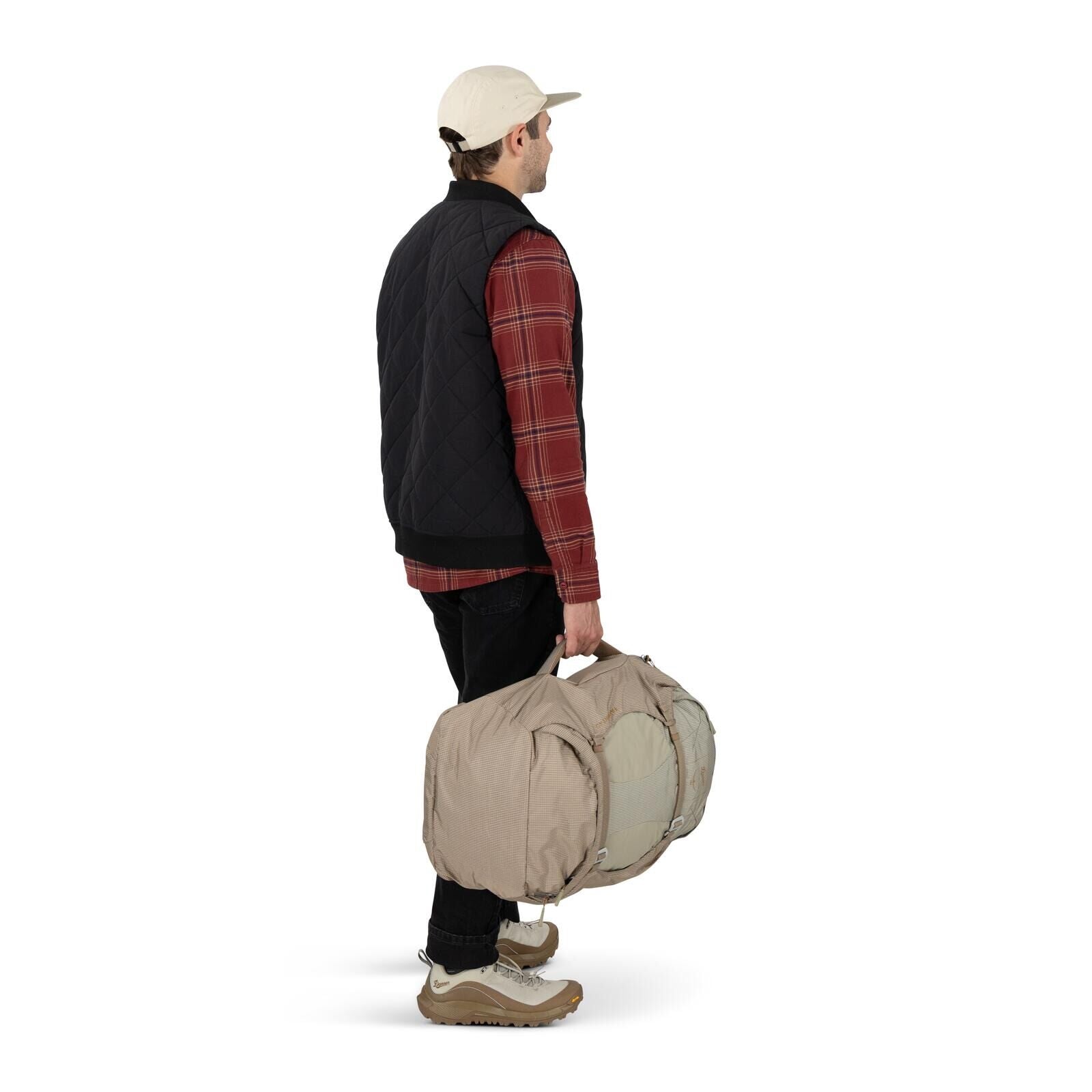 on-body image of Osprey Farpoint 40 and Danner collaboration in the color Sandy Grey-Sawdust