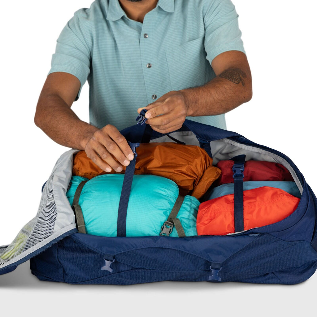 Detailed image of the Osprey Farpoint 70 Travel pack in the color Antique Blue
