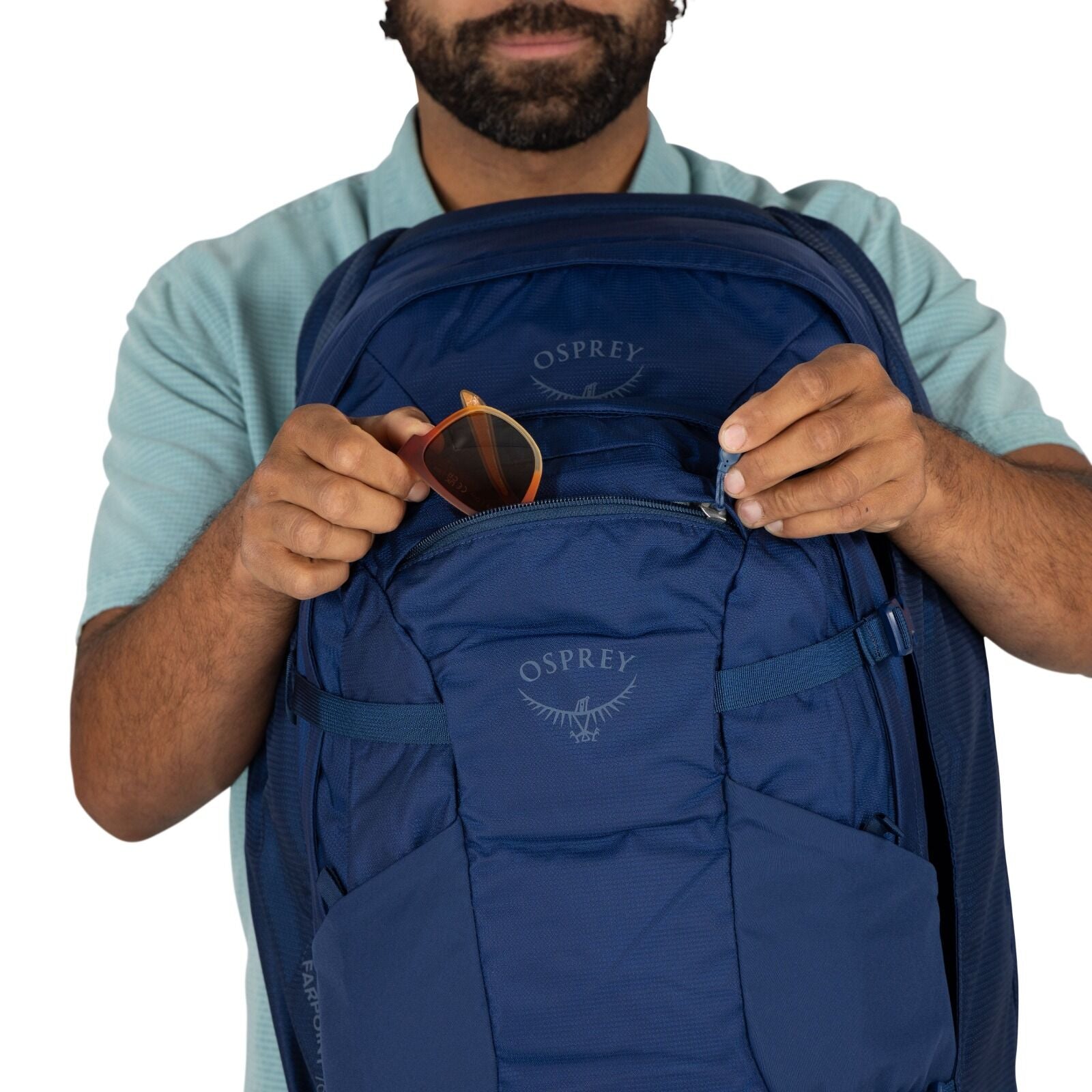 Detailed image of the Osprey Farpoint 70 Travel pack in the color Antique Blue