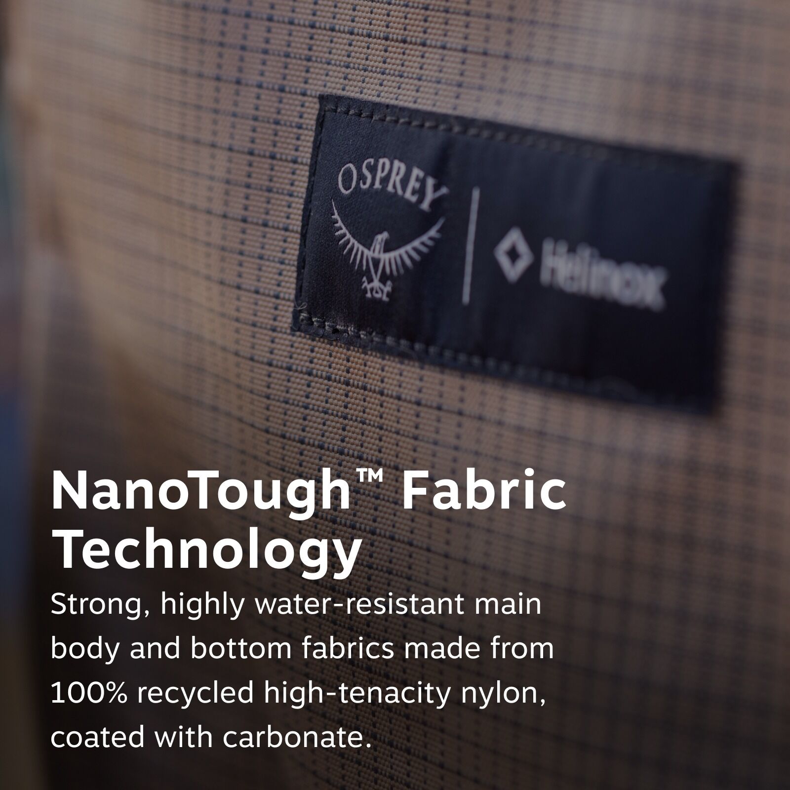 Close-up of a textured fabric with a black label showing a bird logo and text. Overlay text reads, "NanoTough Fabric Technology," emphasizing durability.