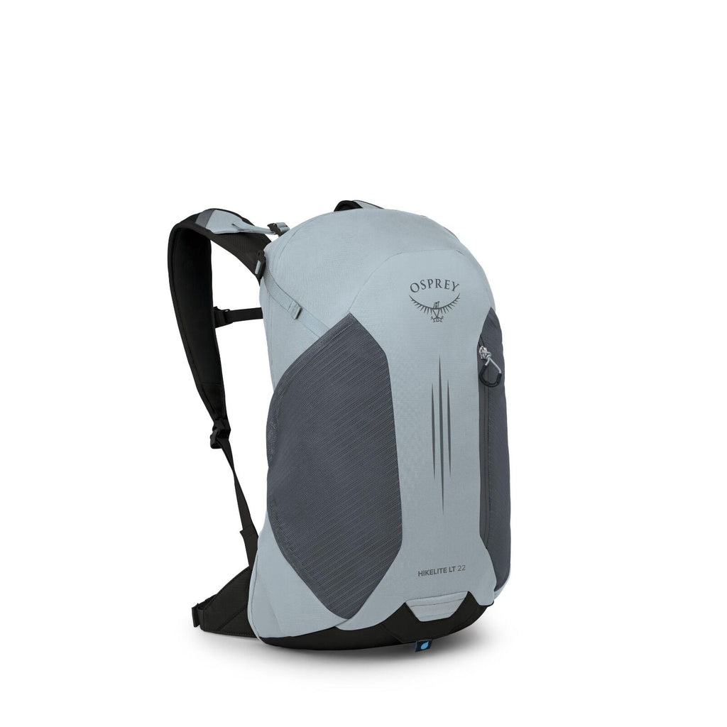 The image showcases an Osprey Hikelite LT 22 backpack in a light blue-gray color. This backpack features a sleek design with a front zip pocket, a top handle, and padded shoulder straps for comfortable carrying. The Osprey logo is prominently displayed on