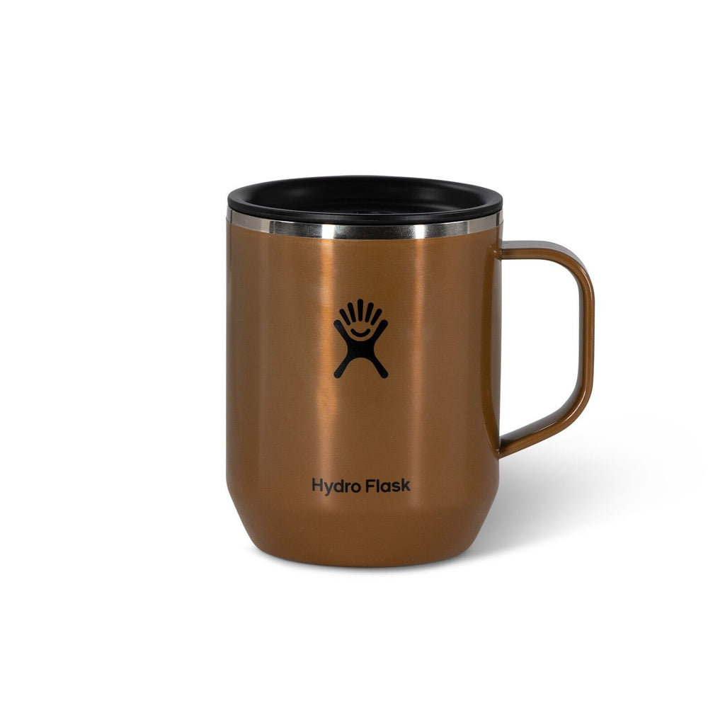 Brown insulated mug with a black lid and handle, featuring a logo of a stylized person on the front. The mug’s matte finish gives a sleek, modern look.