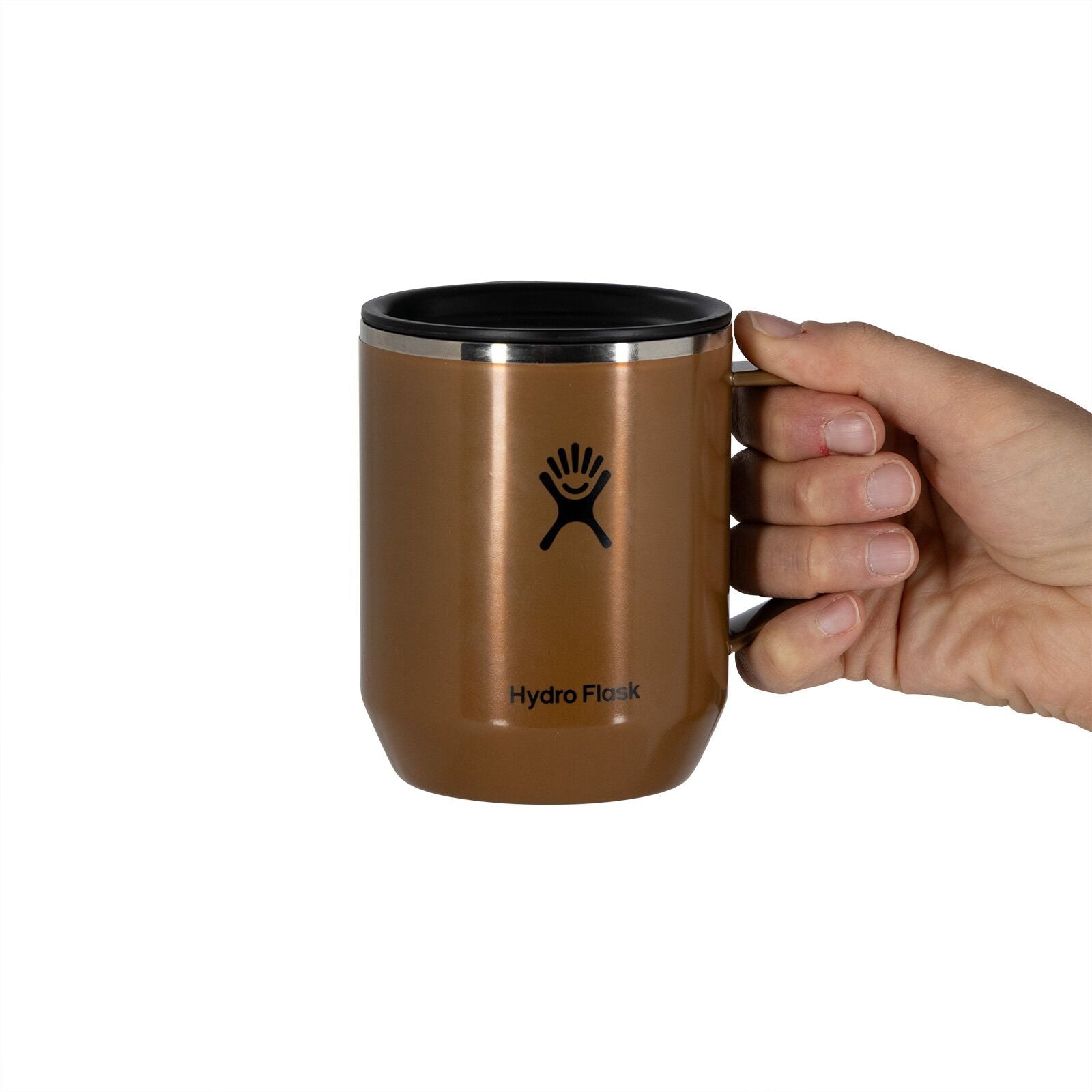 A hand holding a brown Hydro Flask mug with a black logo and text. The mug has a sleek design with a silver rim, conveying a sturdy and modern feel.