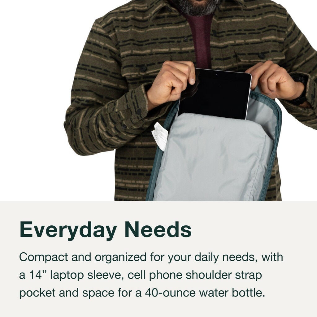 Person placing tablet in backpack's padded sleeve