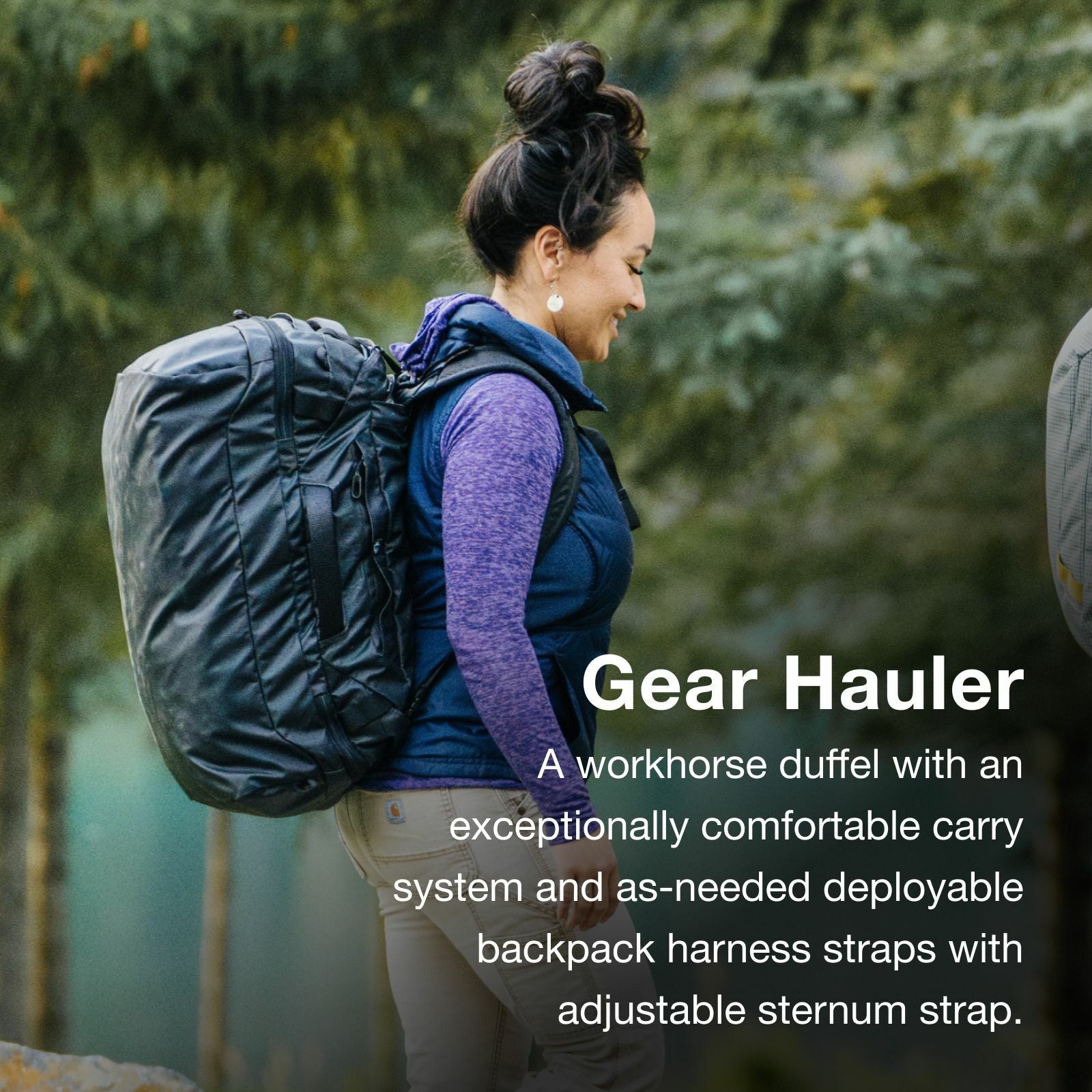 Woman hiking with Gear Hauler duffel backpack