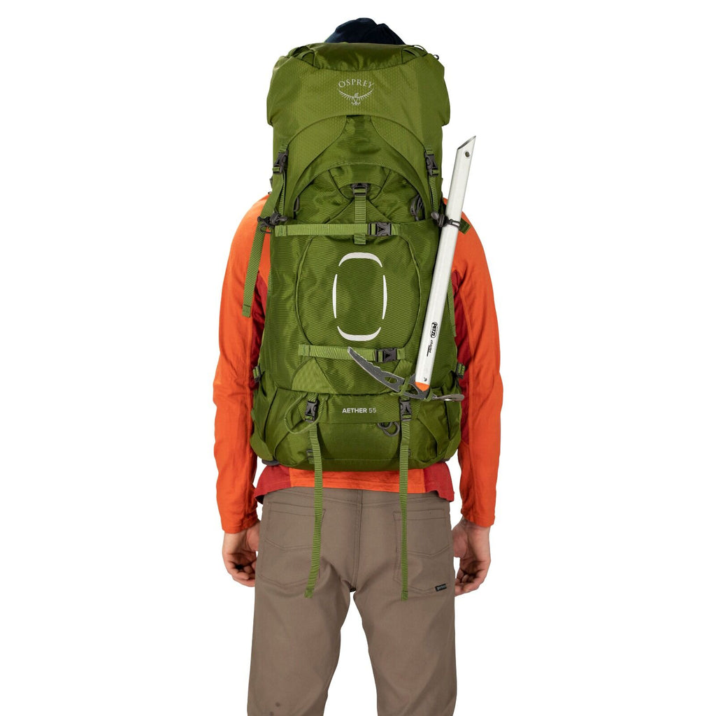 a person modeling the AETHER&trade; 65 in color Garlic Mustard Green