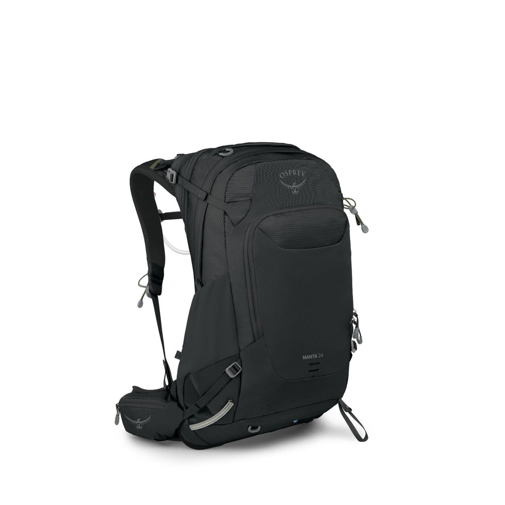 The image displays an Osprey Manta 24 backpack, designed for outdoor use, featuring a sleek, modern design in black. It has multiple compartments and pockets for storage and organization, with a front panel and side zipper openings. The backpack includes