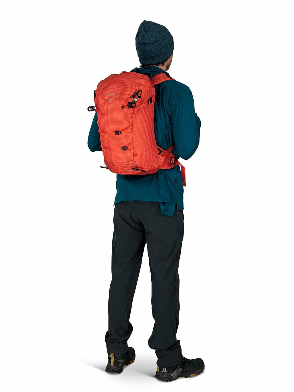 a person modeling the Mutant 22 in color marsorange
