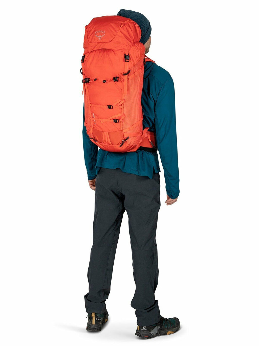 a person modeling the Mutant 38 in color marsorange