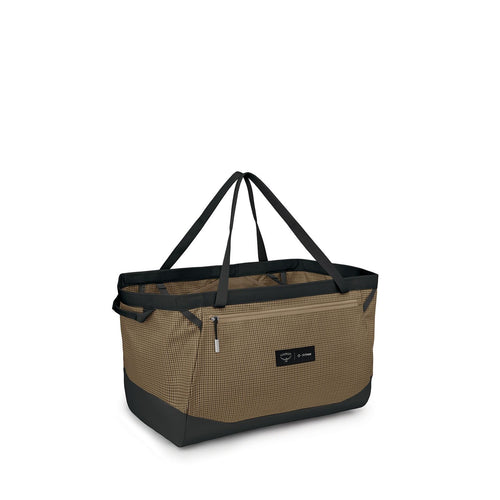 Brown and black checkered tote bag with long handles and a front zipper pocket. The bag has a modern, practical design suggesting versatility.