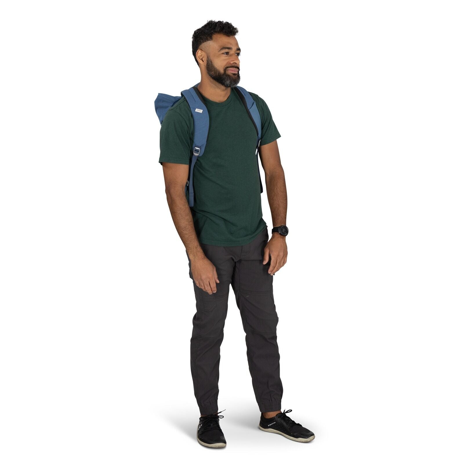 on-body image of the Arcane Roll top pack in the color Nircana Blue Heather