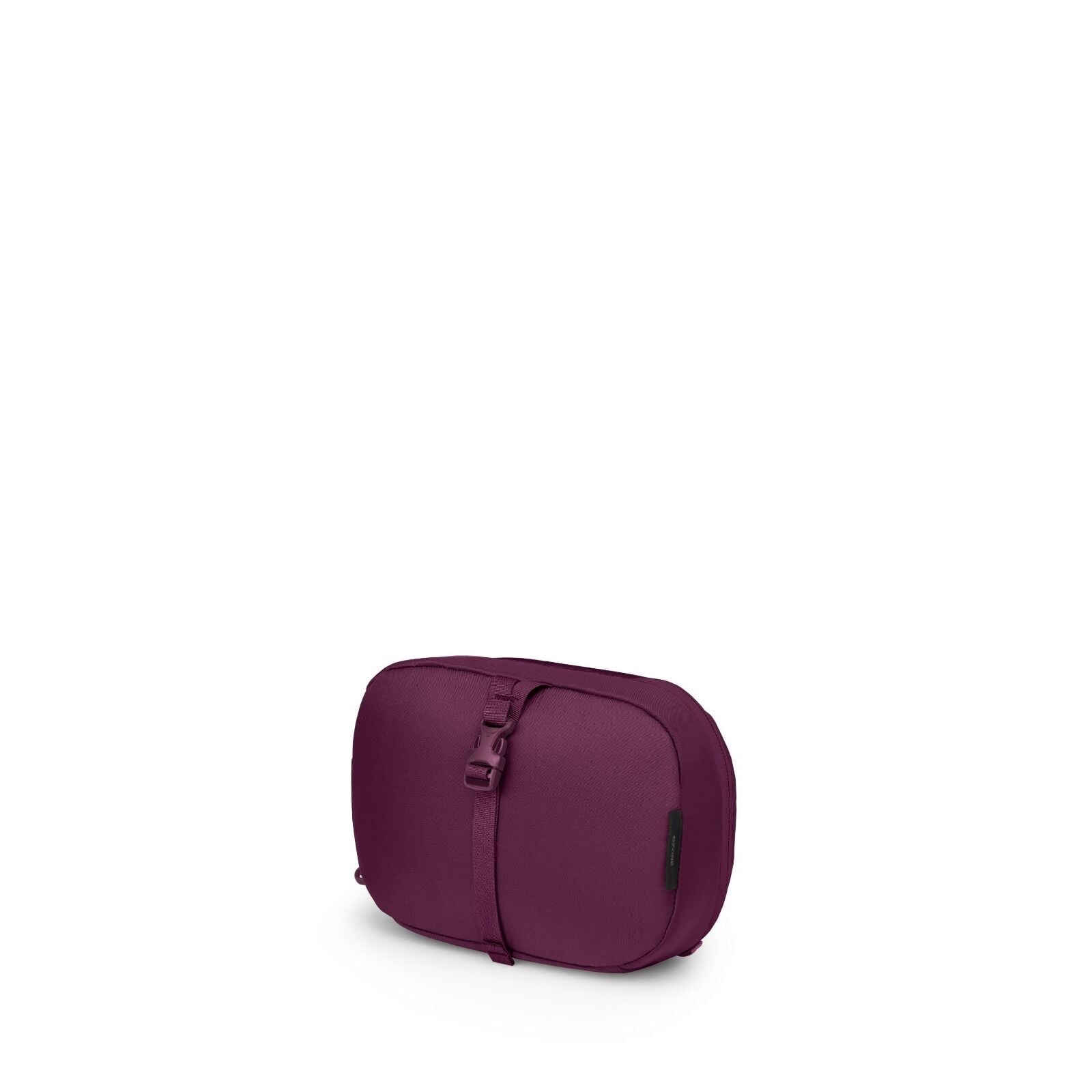 The images show a small, rounded travel pouch in purple tones, photographed on a white background. It has a front compression strap with a side-release buckle running vertically across the pouch. The pouch appears structured yet soft, with a zipper around