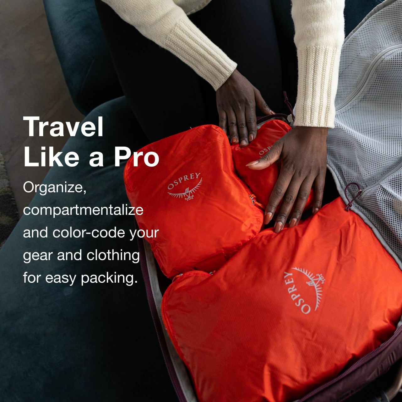 Osprey ultralight packing cube set being packed into Osprey luggage