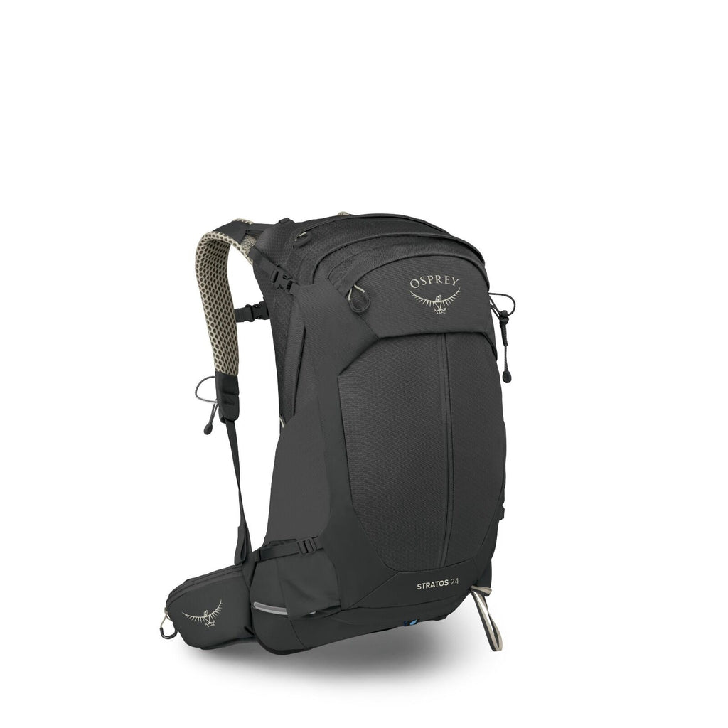 The image shows a black Osprey Stratos 24 backpack, designed for hiking or outdoor activities. The backpack features a structured back panel for airflow, a top-loading compartment with zippers, and side straps for adjustment. It has a hip belt with small