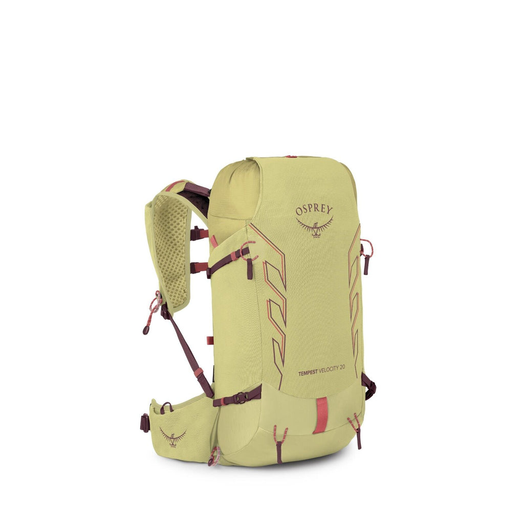 The image displays a lime green Osprey backpack, specifically the "Tempest Velocity 20" model. It features a sleek design with the Osprey logo prominently printed on the front in black, accompanied by the brand's signature bird emblem. The backpack has re