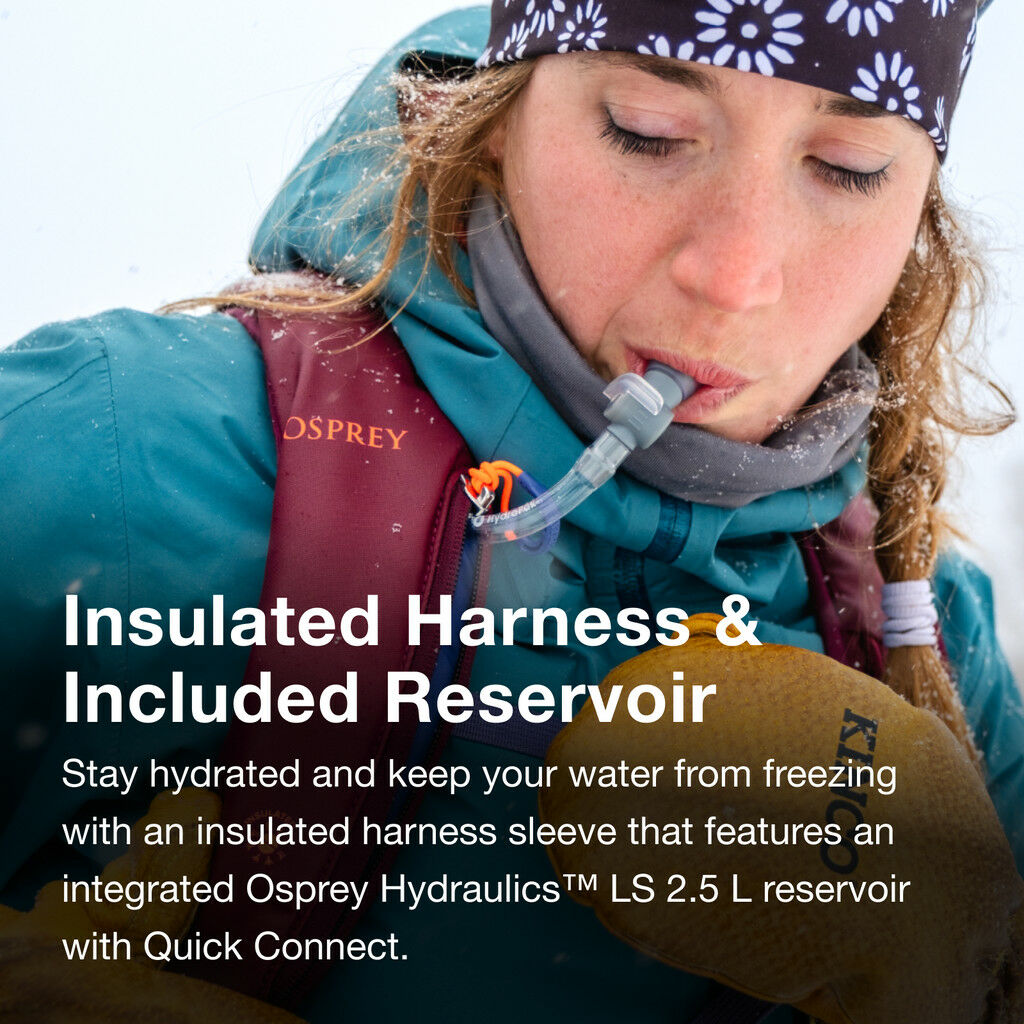 Woman hydrating with Osprey Hydraulics LS 2.5L reservoir and insulated harness.