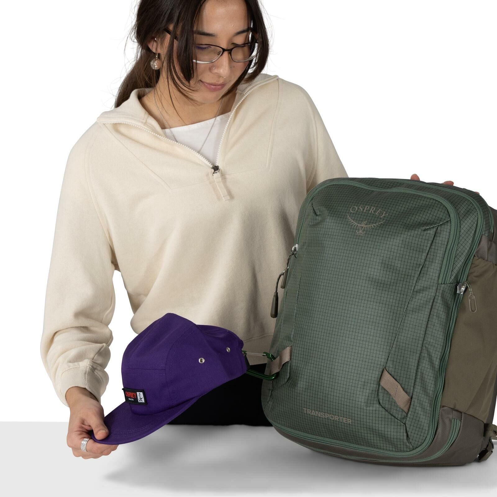 detail image of Osprey's Transporter Travel Pack 26+6 in the color Pine Leaf