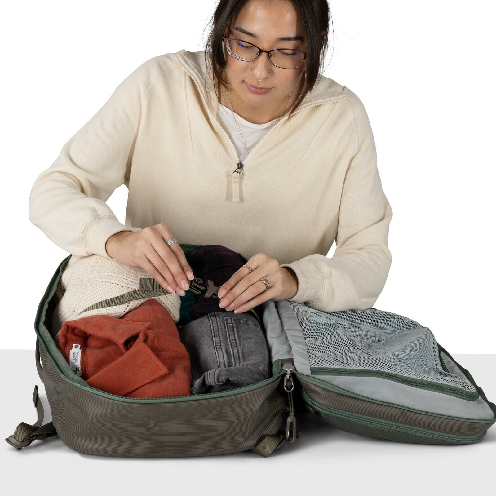 detail image of Osprey's Transporter Travel Pack 26+6 in the color Pine Leaf